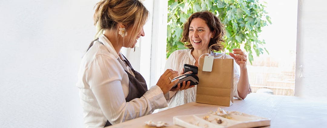 Two_women_at_counter_1700x600-centered