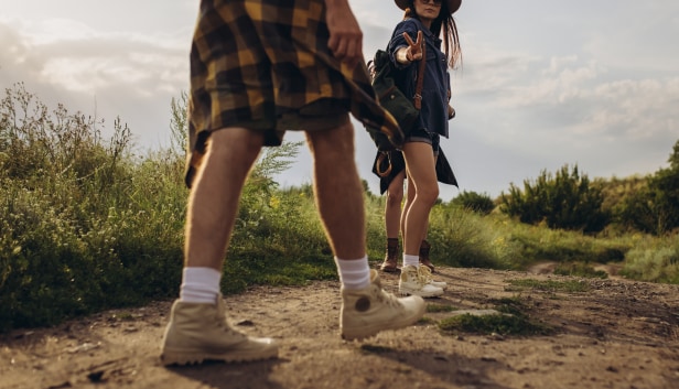 Two people hike on a path to represent how LifeSync offers guidance along the way