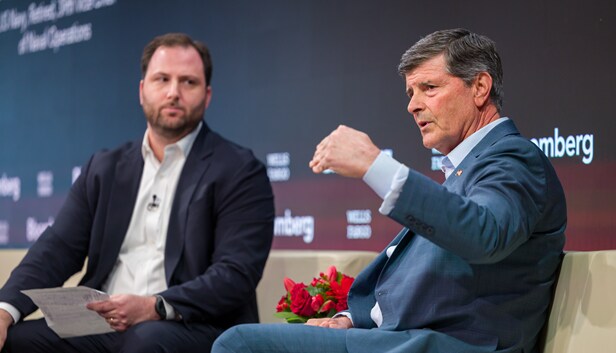 Wells Fargo and Bloomberg logos behind panelists