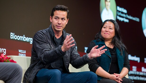 Wells Fargo and Bloomberg logos behind panelists