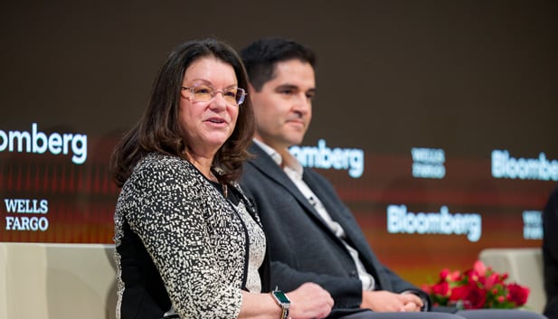 Wells Fargo and Bloomberg logos behind panelists