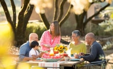 family dining outdoors